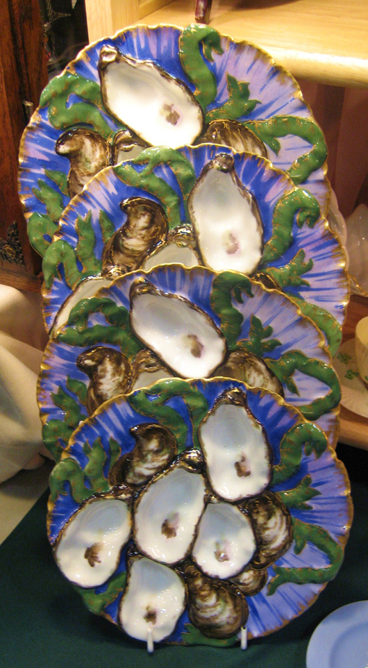 A colorful set of 12 oyster plates, Havilland, circa 1890, in rare Turkey pattern was available for $1,800 from Kathy Tarr, a Havilland expert from Massachusetts and Melbourne, Fla. Image courtesy of West Palm Beach Antiques Festival.