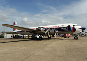 The restored DC-7B N836D at San Juan International Airport in May 2011. Image courtesy of Wikimedia Commons.