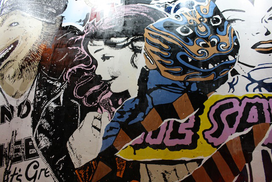 A close-up of the large-scale, graphic art collage by Faile. Mural by Faile, photography by Kelsey Savage Hays.