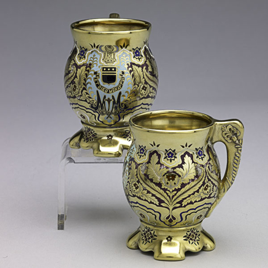 Two silver gilt and enameled cups from the Mackay service, Tiffany & Co., 1878. with the monogram 'MLM' for Marie Louise Mackay. Estimate: $5,000-$7,000. Image courtesy of Rago Arts and Auction Center.