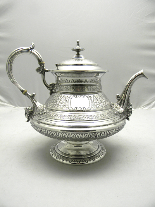 French Victorian mask decorated silver coffeepot (27ozt) made by E. Hugo. Image courtesy of Wilson's Auctioneers & Appraisers.