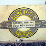 A metal sign, 42 by 30 inches, advertises passenger service on the Clinchfield Railroad. Image courtesy of LiveAuctioneers.com Archive and Dotta Auction Co.