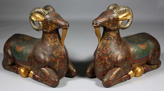 Pair of recumbent rams, China, mid-19th century, of enameled wood, 28 inches high x 11 inches wide x 25 inches long. Estimate: $30,000-$50,000. Image courtesy of Kaminski Auctions.