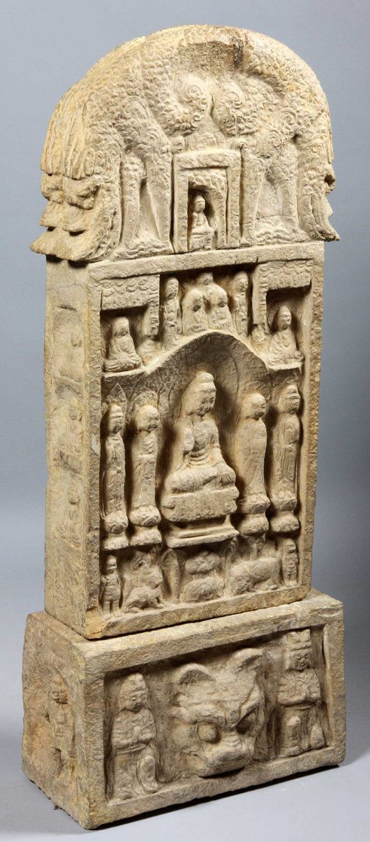 Carved stone Buddha, China, 31inches high x 15 inches wide x 5 inches deep. Estimate $20,000-$30,000. Image courtesy of Kaminski Auctions.