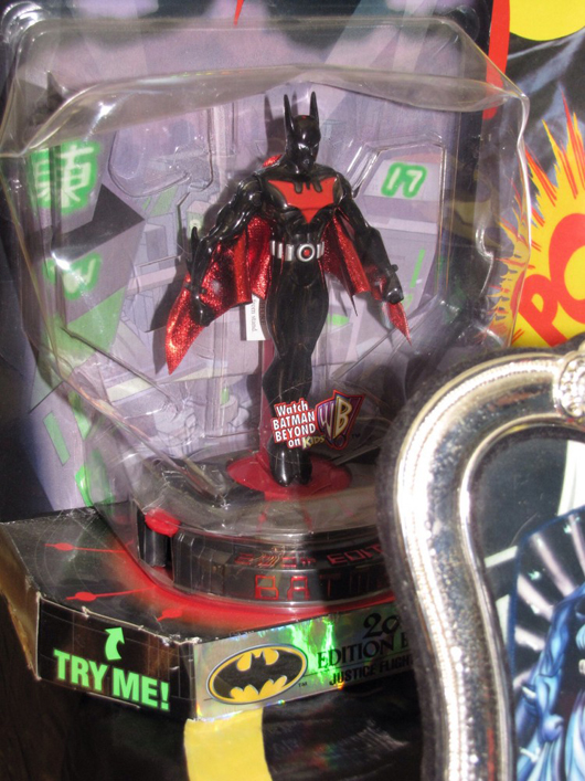 Batman action figure with the original store display that invites buyers to “Try Me.”