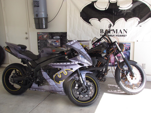 Antonio has not one but two motorcycles tricked out with Batman logos and paraphernalia.
