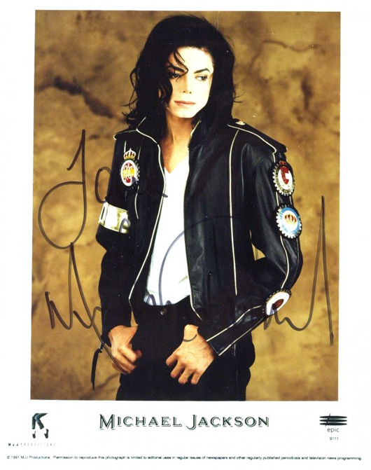 An 8-by-10 promotional photograph signed 'Love, Michael Jackson.' Image courtesy of LiveAuctioneers.com Archive and The Written Word Autographs.