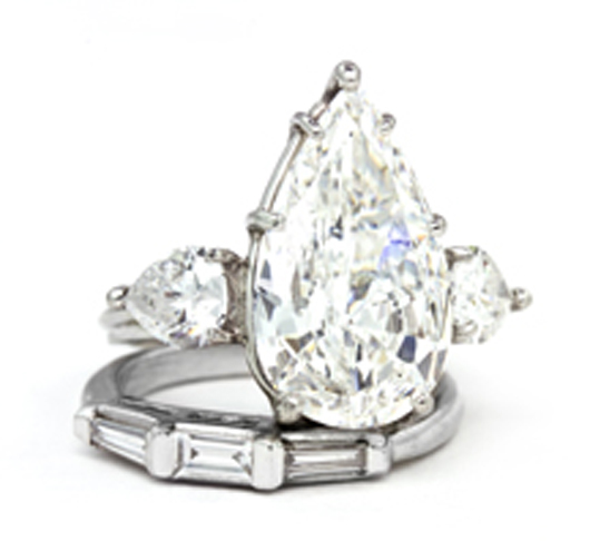 Platinum and 5.69-carat pear- shape diamond ring sold for $115,900. Image courtesy of Leslie Hindman Auctioneers.