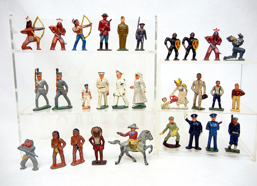 Britains figurines, both military and civilian types. Stephenson’s image.