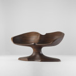 Wendell Castle important two seat sofa, USA, 1967, stack-laminated and carved walnut, 56 inches wide x 28 inches deep x 29 1/2 inches high, carved signature to base: ‘WC 67.’ Estimate: $70,000-$90,000. Image courtesy of Wright.
