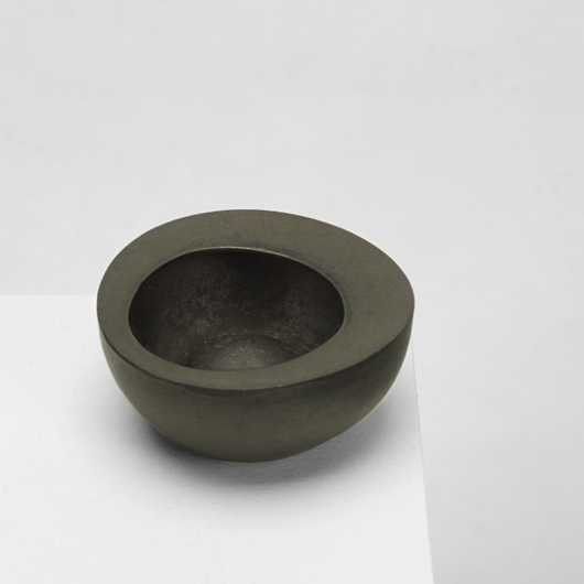Isamu Noguchi rare bowl, Ooi Kojo for Bonniers, USA, c. 1950, cast iron, 5 3/4 inches wide x 5 1/2 inches deep x 2 1/2 inches high, only known example of this design, signed with cast manufacturer's mark to underside: ‘Bonniers Japan.’ Estimate: $20,000-$30,000. Image courtesy of Wright.