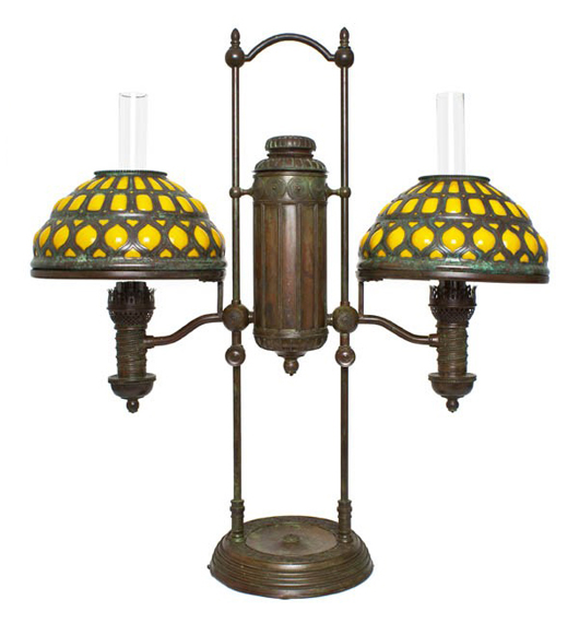 Tiffany Studios bronze and glass double student lamp, 29 inches high, each shade 10 1/4 inches diameter. Estimate: $15,000-$25,000. Image courtesy of Leslie Hindman Auctioneers.