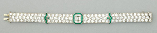 Art Deco diamond and emerald platinum strap bracelet. Realized: $33,480. Image courtesy of Rago Arts and Auction Center.