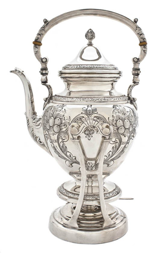 American sterling silver teapot and burner, Frank M. Whiting & Co., approximate weight overall 59.60 troy ounces, 12 1/4 inches high. Estimate: $1,500-$2,500. Image courtesy of Leslie Hindman Auctioneers. 