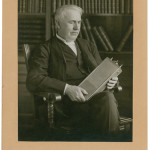 Photo of Thomas Edison holding his 1910 invention, the alkaline storage battery. The autographed photo sold at RR Auction for $32,310. Image appears with permission of RR Auction.