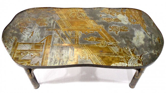 Bronze coffee table by Philip and Kelvin LaVerne hand-chased work throughout, circa 1965, signature on the tabletop, 17 inches high x 47 inches long x 21 1/2 inches wide. Estimate: $4,000-$6,000. Image courtesy of Bruce Kodner Galleries.   