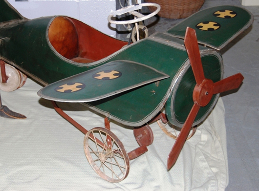 This World War I-era pedal car was offered for $1,250. Image courtesy of the West Palm Beach Antiques Festival.
