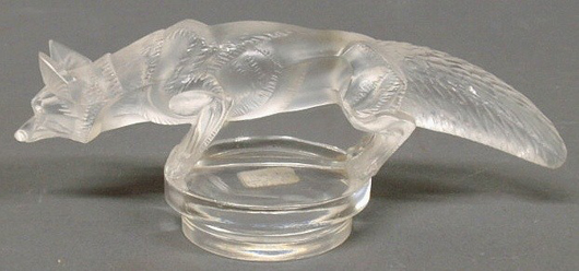 Lalique 'Renard' fox car mascot, sold in a grouping of five decorative foxes for $204,750. Image courtesy of LiveAuctioneers.com and Wiederseim Associates Inc.