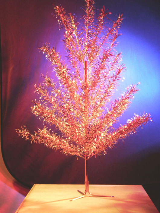 Many aluminum trees utilized a rotating color wheel which projected colored light up through the tree from the floor. This circa 1960 aluminum tree is in the permanent collection of the Children's Museum of Indianapolis. This file is licensed under the Creative Commons Attribution-Share Alike 3.0 Unported license.