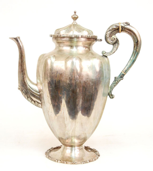A beautifully proportioned mid-20th-century Mexican silver coffee pot stamped P Lopez G on the bottom, weighs 45.5 ozt. Stephenson’s Auctioneers image.