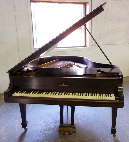 Steinway & Sons walnut Model B grand piano. Stephenson’s Auctioneers image.