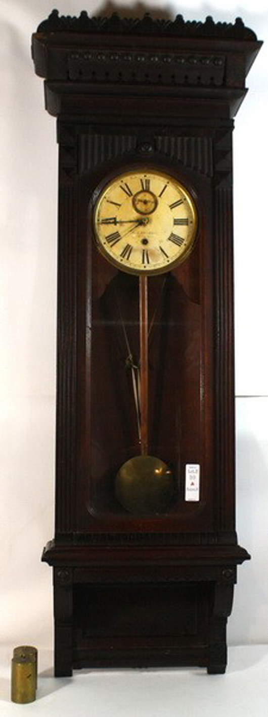 Gilbert 30-day Regulator factory clock from Hudson Factory, 49-inch walnut case, in good working order. Estimate: $2,000-$3,000. Image courtesy of Saco River Auction Co.