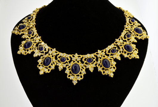 18K yellow gold necklace with 36.15 carats of genuine Ceylon cabochon sapphires and 3.5 carats of diamonds, est. $32,000-$64,000. Government Auction image.