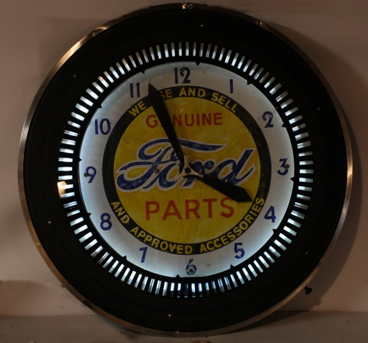 Genuine Ford Parts neon rotating wall clock, 21 inches, working condition. Estimate: $500-$700. Image courtesy of Saco River Auction Co. 
