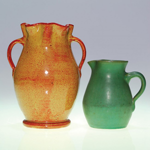 The 7 1/2-inch vase on the left is an example of Waco Pottery's desirable Strawberry glaze. The green matte glaze pitcher is 4 7/8 inches high. They sold at auction as one lot recently for $500 plus a buyer's premium. Image courtesy of LiveAuctioneers.com Archive and Humler & Nolan.