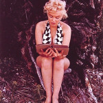 Eve Arnold shot many pictures of Marilyn Monroe from 1951 onward. She took this picture, a vintage Ektacolor print, of Marilyn reading a book circa 1960. Image courtesy of LiveAuctioneers.com and Clark's Fine Art & Auctioneers Inc.