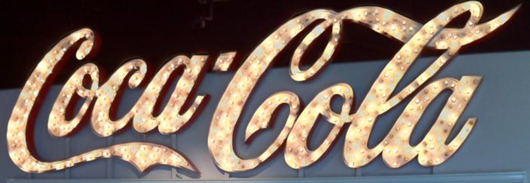 The lights blink randomly on this large outdoor sign that was once a fixture atop a building in Asheville, N.C.