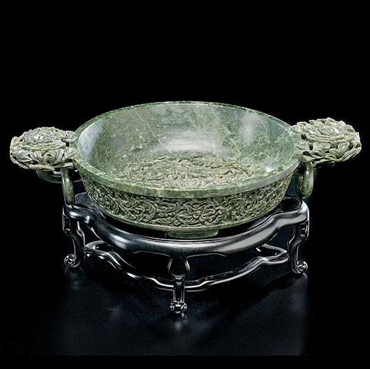 Chinese spinach jade marriage bowl. Estimate $10,000-$15,000. Image courtesy of Cowan's Auctions Inc.