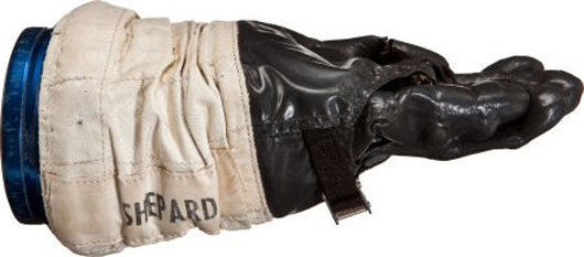 The sale of a  glove used in training by astronaut Alan Shepard for an Apollo mission has been questioned by NASA. Image courtesy of LiveAuctioneers.com Archive and Heritage Auctions.