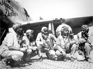 Pilots of the 332nd Fighter Group, Tuskegee Airmen, at Ramitelli Airfield in Italy. Image courtesy of Wikimedia Commons.