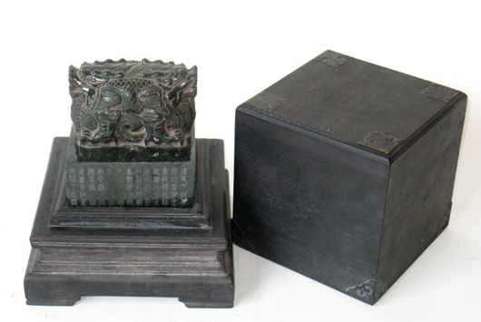 Chinese imperial seals, all incised with calligraphic writings, in a carved zitan box sold as a single lot for $6,545. Image courtesy of Gordon S. Converse & Co.