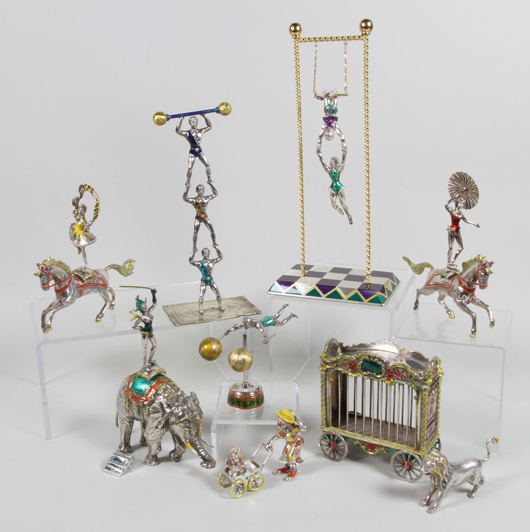A 17-piece circus set of enameled silver by Moore for Tiffany & Co. sold for $30,420. The largest piece was 13 inches tall. Image courtesy of Kaminski Auctions.   