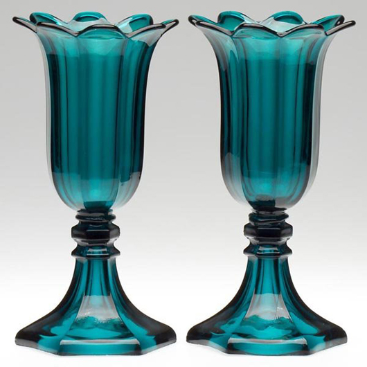 A pair of important pressed Boston & Sandwich Glass Co. tulip vases in deep teal blue, circa 1845-1865. Auctioned by Jeffrey S. Evans & Associates on May 22, 2010 for $15,210. Image courtesy of LiveAuctioneers.com and Jeffrey S. Evans & Associates.