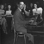 Cole Porter at the piano. Image courtesy of Leslie Hindman Auctioneers.