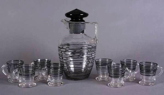 Steuben glass pitcher and eight glasses, American, 20th century. Estimate $800-$1,200. Image courtesy of Stefek's Auctioneers & Appraisers.
