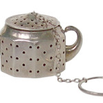 This 1-inch-high octagonal teapot is a tea infuser, the inspiration for the teabag. It is sterling silver and would sell for about $100. It can be used every day. Just open the top and, because tea leaves expand, fill it less than halfway. Then dip it in a cup of hot water.