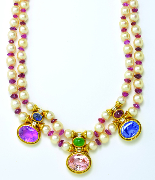 This exquisite Bulgari ruby rondelle bead and opal two-strand choker necklace is set with sapphire and emerald cabochons and is estimated to sell for $125,000 to $175,000. Image courtesy of Clars Auction Gallery. 