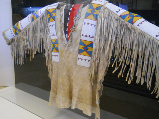 Blackfoot beaded war jacket, Montana, late 1800s, displayed in shadowbox. Estimate $30,000-$250,000. Image courtesy of King’s Auction.