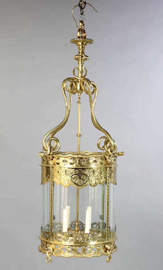 Nineteenth-century English gilt bronze lantern with coiled snakes and Aesthetic Movement-style pierce work, circa 1880, 46 inches high. Estimate: $4,000-$6,000. Image courtesy of Kamelot Auction House. 