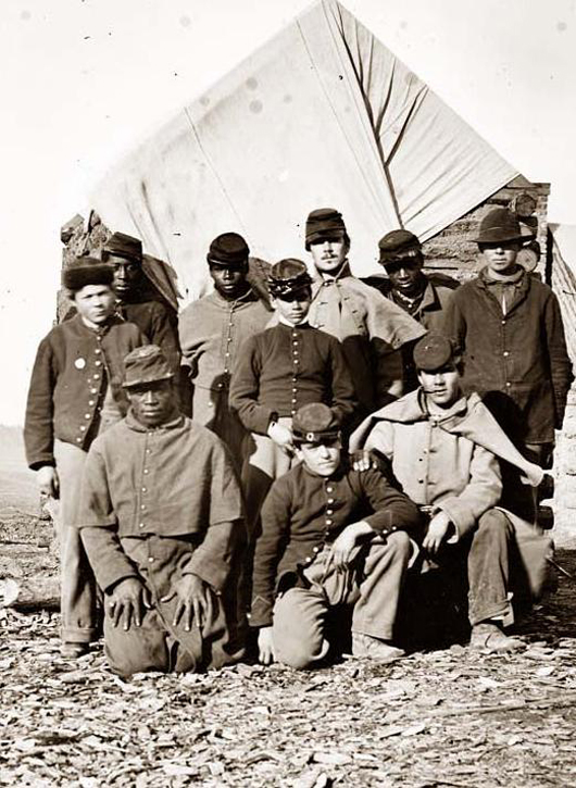 This 1861 photo depicts Union soldiers in an unidentified setting.