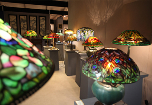An array of stunning Tiffany Studios lamps illuminated the Lillian Nassau display. Image courtesy of Naples Art, Antique & Jewelry Show.