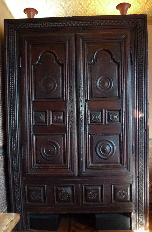 This large circa-1690 armoire has been converted to house a music system in Burstyn's bedroom. Image by Susan McTigue.