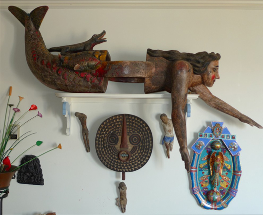 A 6-foot-long mermaid mask with movable arms and tail that moves behind her, bought in Mexico. Image by Susan McTigue.