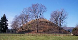 Grave Creek Mound in Moundsville, W.Va. Image by Tim Kiser. This file is licensed under the Creative Commons Attribution-Share Alike 2.5 Generic license.