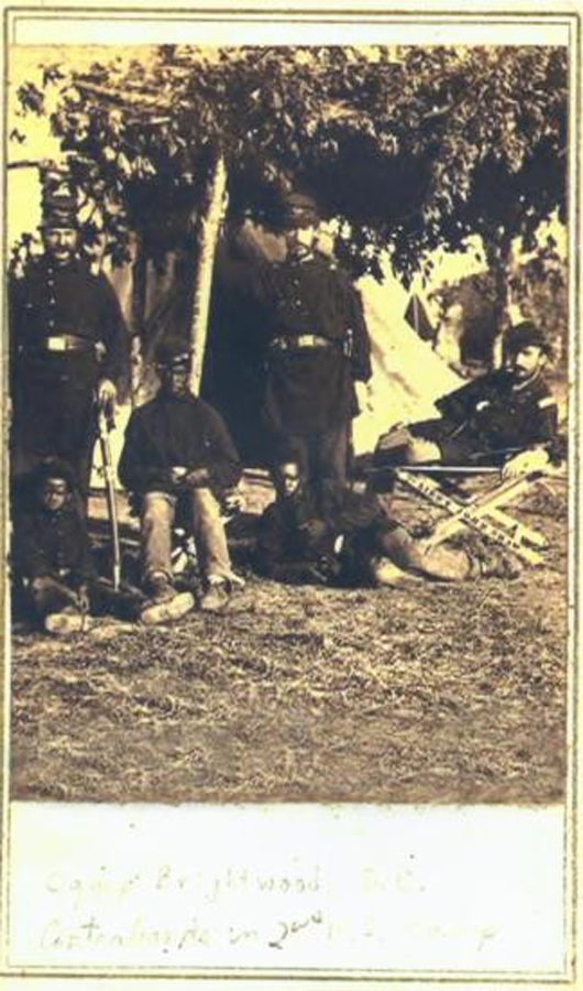Civil War photo depicting black soldiers at Camp Brightwood, Washington, D.C., 8 inches x 5 inches. Estimate: $50-$75. Image courtesy UniversalLive.   