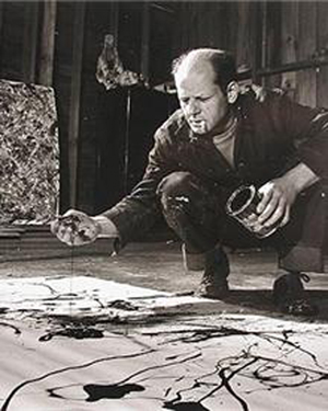 Jackson Pollock working in his studio. Photo by Martha Holmes. Image courtesy Wikipaintings.org.